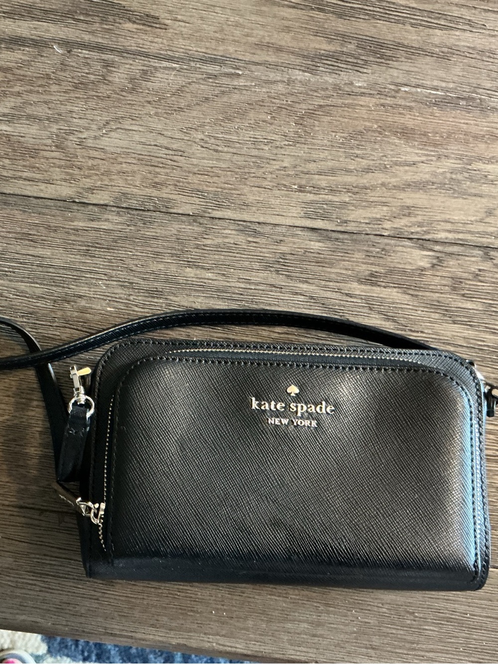 kate spade black crossbody with gold logo